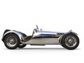 Chrome plated vintage sport open wheel racing car - side view Royalty Free Stock Photo