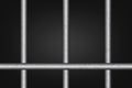 Chrome prison bars on black background