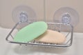 Chrome soap tray, wall mounted holder dish, white porcelain china basin, beige tiles, used green, creamy ivory soap bars, large