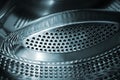 Chrome washing machine drum background. Royalty Free Stock Photo