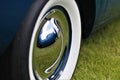 Chrome Wheel With White-Wall Tire On A Classic Car