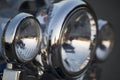 Chromed motorcycle headlights close up Royalty Free Stock Photo
