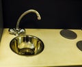 Chromed shiny kitchen faucet and sink for washing dishes