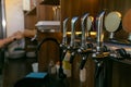 Chromed taps for draft beer in a modern bar Royalty Free Stock Photo