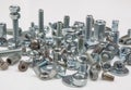 chromeplated bolts and nuts on white Royalty Free Stock Photo