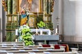 Chruch interior with candles and flowers