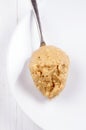 Chrunchy peanut butter on a spoon Royalty Free Stock Photo