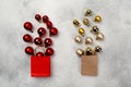 Chrustmas baubles poured out of paper bag