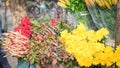 Chrysanthemum, rose and water lily arranged on bicycle street vendor in Hanoi