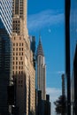 Chrysler Building at daylight with moon in winter afternoon Royalty Free Stock Photo