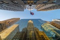 Chrysler building in glass windows reflection with american flag above at sunset, New York city, USA Royalty Free Stock Photo