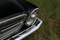 Black Chrysler 300 left headlight Royalty Free Stock Photo