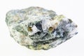 chrysoberyl crystals in raw beryl stone on white Royalty Free Stock Photo