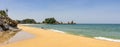 Panorama of Jeungsan Beach with buildings and Candlestick Rock, korean Chotdaebawi in background. Donghae, Gangwon Province, South