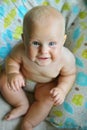 Chubby Baby Sitting in House Smiling