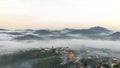 the chuch in fog ,The small village in fog, somewhere near Dalat, Vietnmam Royalty Free Stock Photo