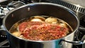 A chuck beef roast in a large pot on the stove. Royalty Free Stock Photo