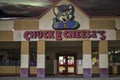 Chuck E Cheeses arcade and restaurant at night entrance