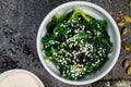 Chuk seaweed salad and sesame seeds. Chinese cuisine.