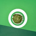 Chuka Seaweed Salad in bowl on green background, copy space. Japanese Cuisine - Chuka Salad Royalty Free Stock Photo