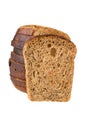 Chunk of bread with raisin against the cut loaf Royalty Free Stock Photo