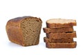 Chunk of rye bread with anise and some slices Royalty Free Stock Photo