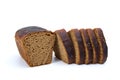 Chunk of rye bread with anise and some slices Royalty Free Stock Photo