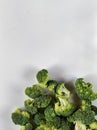 Chunked of broccoli for photography purposes as food background in negative space