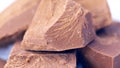 Chopped premium Belgian Gianduja chocolate macro closeup. Royalty Free Stock Photo