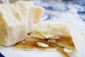 Chunks and rind of parmigiano cheese