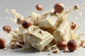 White chocolate and hazelnuts falling and splashing in a vibrant culinary display Royalty Free Stock Photo