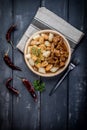 Chunky beef stew with savory sauce beside potato dumplings. Royalty Free Stock Photo