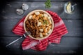 Chunky beef stew with savory sauce beside potato dumplings. Royalty Free Stock Photo