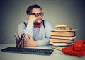 Man willing to eat burger at workplace Royalty Free Stock Photo