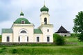 Historic Church of Alexander Nevsky and Khotyn Fortress watch tower on the Dniester river bank in Ukraine. Royalty Free Stock Photo