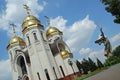 The Church of All Saints and the giant `The Motherland Calls` statue at Mamayev Kurgan in Volgograd