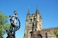 Church and anchor statue, Tamworth. Royalty Free Stock Photo