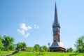 The wooden Church of the Archangels Michael and Gabriel in Surdesti village, Maramures county, Romania. Royalty Free Stock Photo