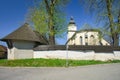 The Church of the Assumption of the Virgin Mary in Lubica with fortication wall