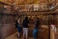 The church attendant talking to visitors in the Church of the Apostles located on the shores of the Sea of Galilee, not far from Royalty Free Stock Photo