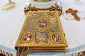 Church attribute a golden Bible with a lock on the altar, gospel, holy, gold crowns for brides with crosses