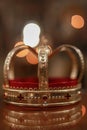 Church attributes for wedding ceremony. Gold crown on the altar Royalty Free Stock Photo