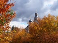 Church in the autumn landscape of the city. The Church dome surrounded by beautiful autumn trees. Details and close-up.