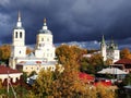 Church in the autumn landscape of the city. The Church dome surrounded by beautiful autumn trees. Details and close-up.