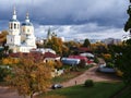 Church in the autumn landscape of the city. The Church dome surrounded by beautiful autumn trees. Details and close-up.