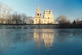 Church on the banks of the frozen river Royalty Free Stock Photo