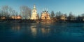 Church on the banks of the frozen river Royalty Free Stock Photo