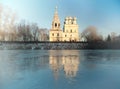 Church on the banks of the frozen Royalty Free Stock Photo