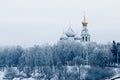 Church on the banks of the frozen river Royalty Free Stock Photo