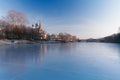 Church on the banks of the frozen river Royalty Free Stock Photo